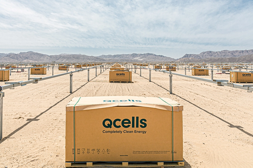 Hanwha Qcells’ energy storage systems positioned for deployment in a desert environment.